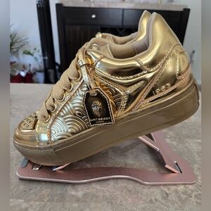 Kurt Geiger London Southbank Tag Platform Sneakers in metallic gold.  Size 38